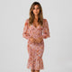 Vestido midi fruncido con volante