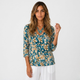 Blusa fluida de escote en pico