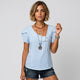 Blusa de rayas con volante