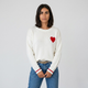 Jersey de punto con corazón bordado