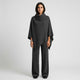 Conjunto de punto con poncho fluido