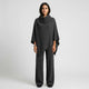 Conjunto de punto con poncho fluido