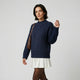 Jersey de punto trenzado | cuello alto estructurado | aporta abrigo y presencia equilibrada
