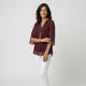 Blusa fluida con manga semitransparente y bajo redondeado | ligereza elegante y comodidad prolongada