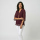 Blusa fluida con manga semitransparente y bajo redondeado | ligereza elegante y comodidad prolongada