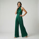 Mono largo halter plisado | caída amplia estructurada | estiliza la silueta con movimiento elegante