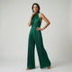 Mono largo halter plisado | caída amplia estructurada | estiliza la silueta con movimiento elegante