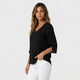 Blusa fluida de escote en pico