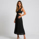 Vestido midi plisado con abertura lateral